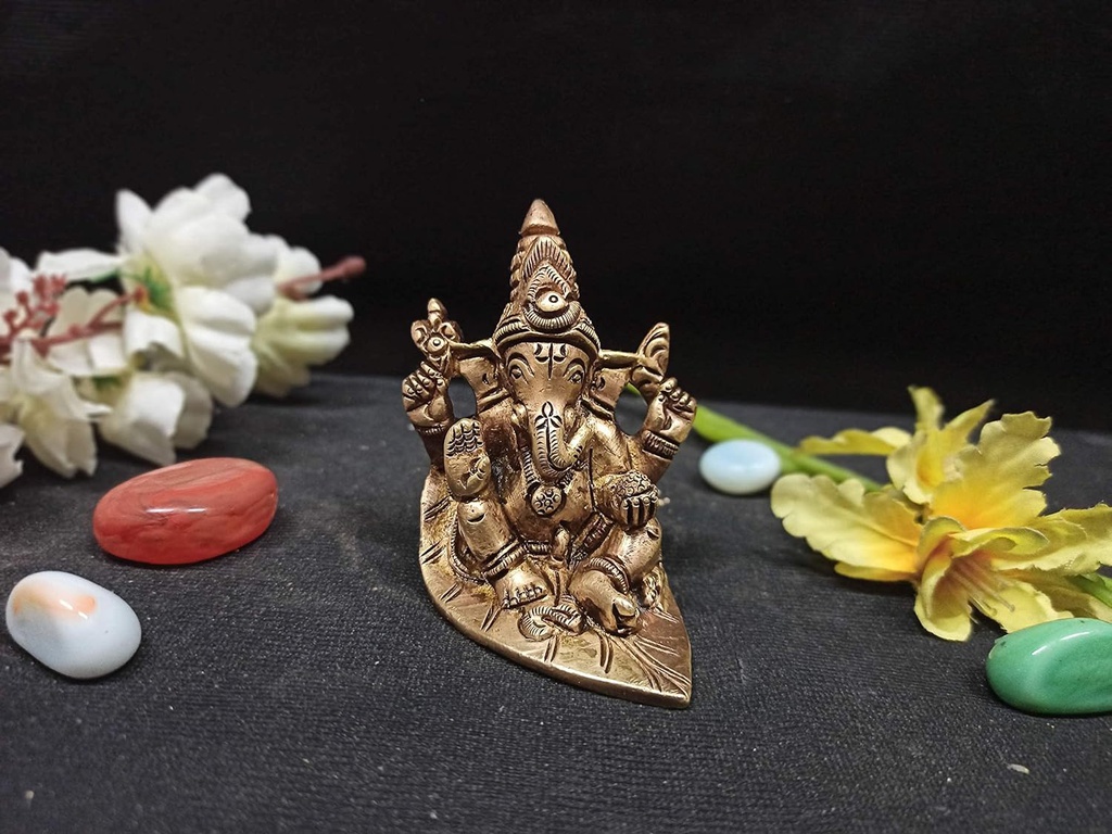 Handcrafted Brass Ganesha Sitting On Leaf Idol